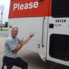 Production Planner Justin Webster Demonstrates His Enthusiasm For Donating Blood.